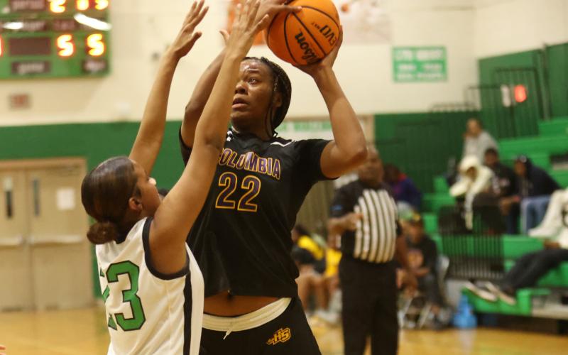 Columbia forward Dariyan Williams tries to get a shot off against Suwannee on Nov. 22. (PAUL BUCHANAN/Lake City Reporter)