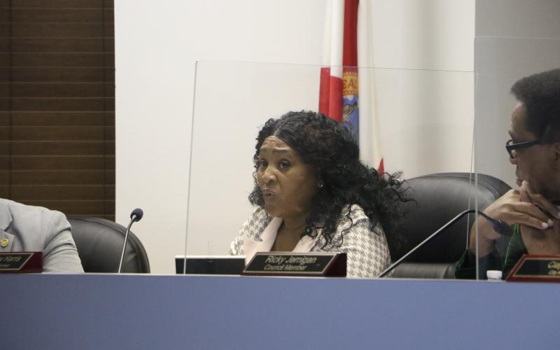 Lake City Councilwoman Tammy Harris said without reducing the fines or removing the liens on a pair of properties, they would never be developed and the city would never collect taxes on those parcels in her district. (MORGAN MCMULLEN/Lake City Reporter)