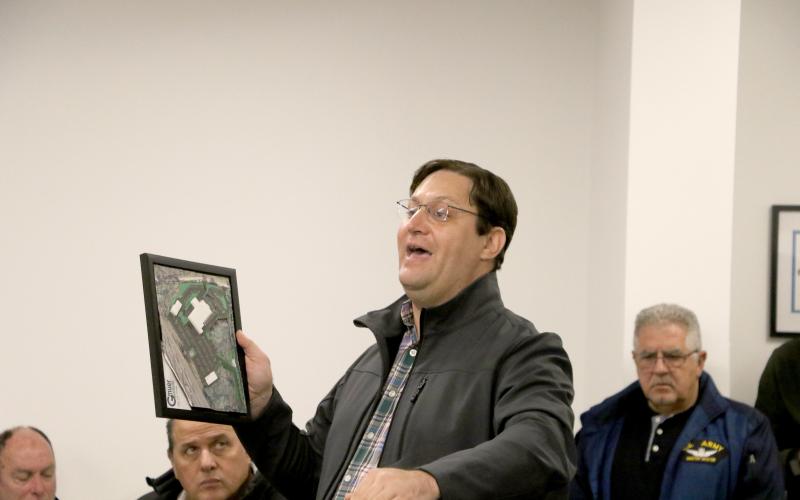 Christopher Gmuer of Gmuer Engineering answers questions about the proposed I-75 Toyota of Lake City dealership north of HCA Lake City Hospital. (MORGAN MCMULLEN/Lake City Reporter)