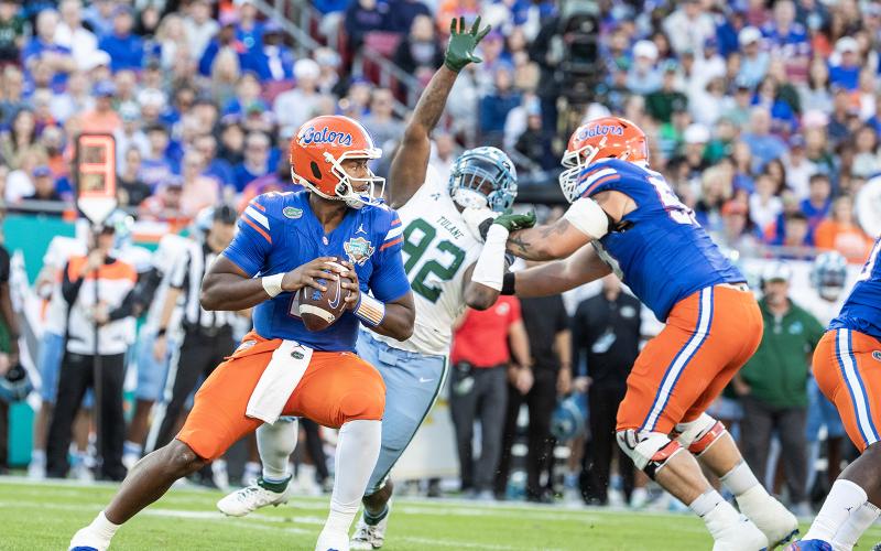 Florida Gators quarterback DJ Lagway prepares to throw the ball against the Tulane Green Wave in the Gasparilla Bowl on Friday at Raymond James Stadium in Tampa. (WILLIE J. ALLEN JR./Orlando Sentinel/TNS)
