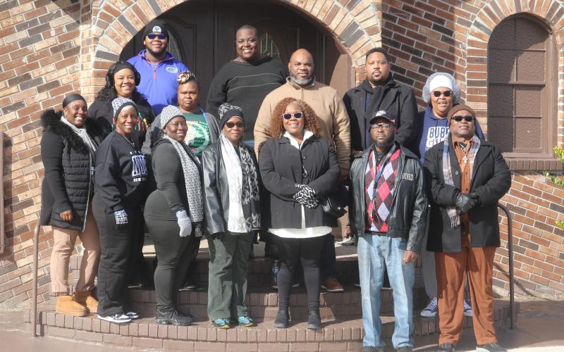 A group of local residents, pictured, braved freezing temperatures on Monday morning and held their own 1.5 mile from the Richardson Community Center to Annie Mattox Park after organizers canceled the MLK Day Parade. Many of the walkers said they felt the parade and King’s legacy was too important to forgo the event due to weather conditions. (TONY BRITT/Lake City Reporter)