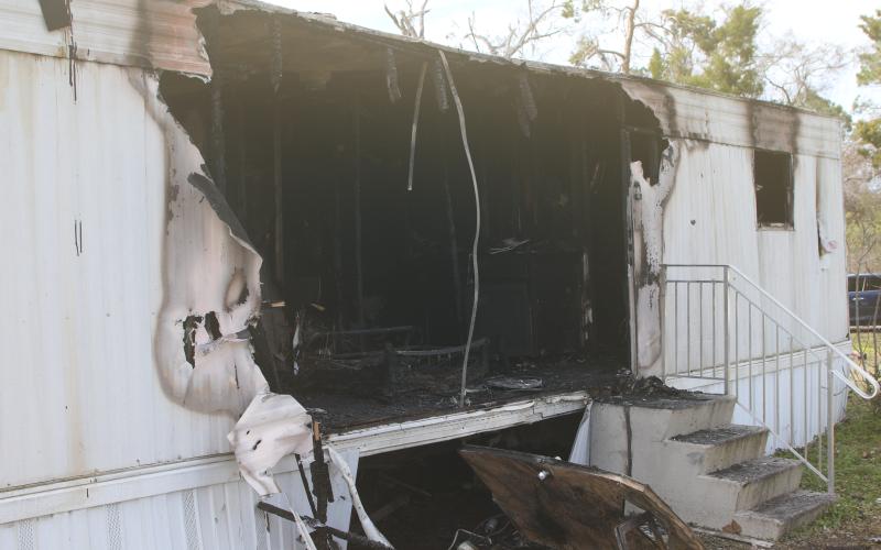 A person was killed Monday morning when a single-wide mobile home caught fire north of Lake City. The cause of the fire is still being investigated. (TONY BRITT/Lake City Reporter)