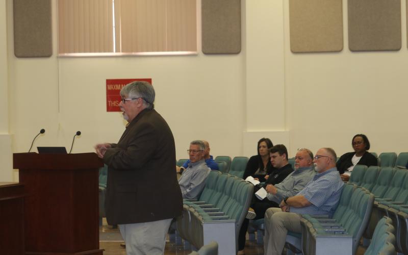 Columbia County Schools Superintendent Keith Couey talks to the School Board about new zoning maps Tuesday. (TONY BRITT/Lake City Reporter)