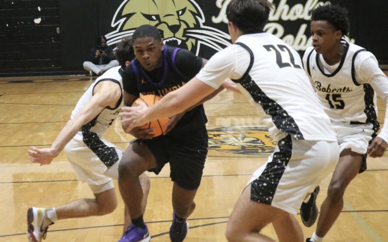 Columbia guard Zamarion Jones drives to the basket in the closing seconds of Tuesday's game against Buchholz. (JORDAN KROEGER/Lake City Reporter)