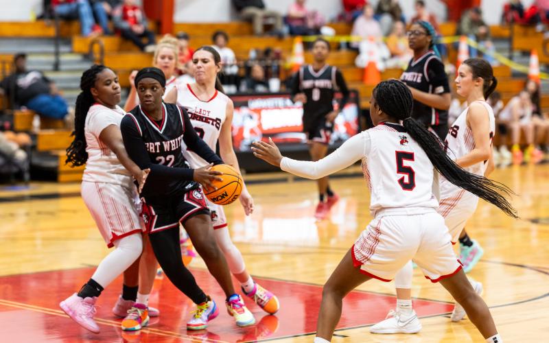 Fort White guard Zuri Hollie drives through the Lafayette defense on Tuesday night. (JACK HOWDESHELL/Lake City Reporter)