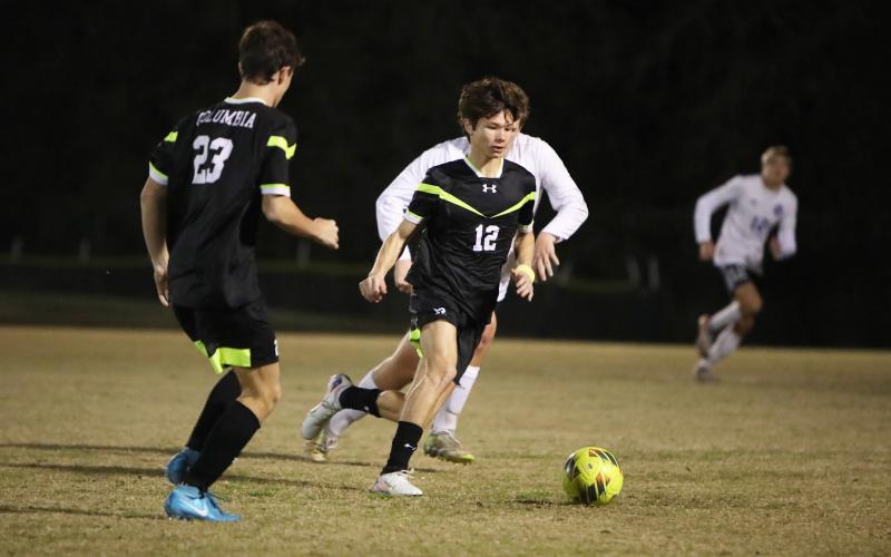Columbia's Peyton Palmer dribbles across the field during a match against Gainesville on Jan. 9. (BRENT KUYKENDALL/Lake City Reporter)