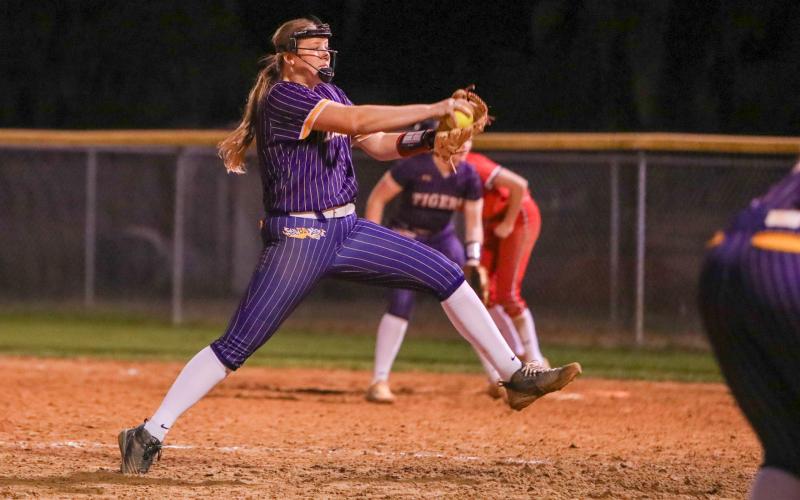 Columbia pitcher Harleigh Price winds up to pitch against Baldwin on Tuesday. (BRENT KUYKENDALL/Lake City Reporter)