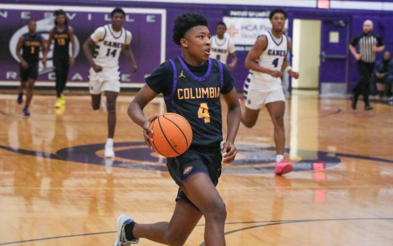 Columbia guard Shaheed White drives to the basket on a fast break against Gainesville on Jan. 23. (BRENT KUYKENDALL/Lake City Reporter)