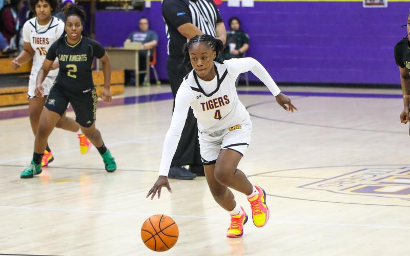 Columbia guard Eriel Baker dribbles up the court on a fast break against Oakleaf on Jan. 29. (BRENT KUYKENDALL/Lake City Reporter)