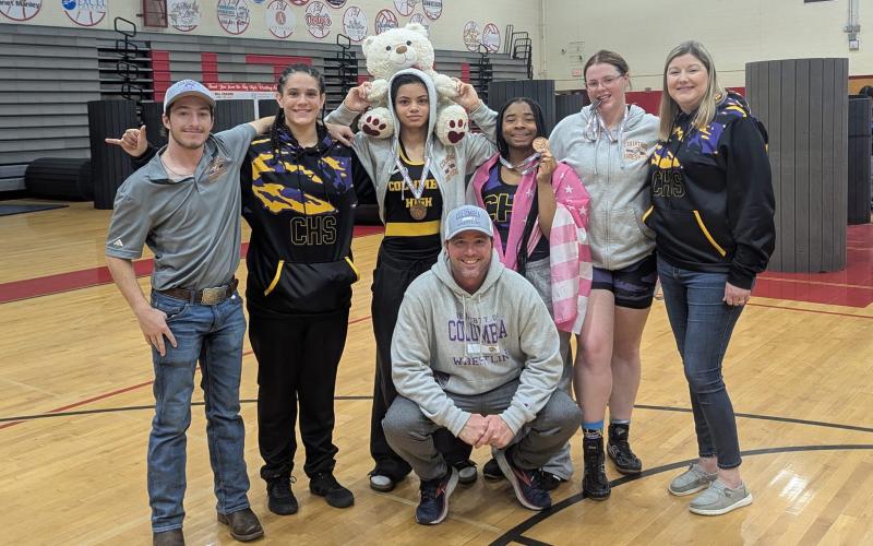 Columbia wrestlers Carlee Morrison, Bella Guerrier-Lajoir, Ja'Niyah Williams and Josie Raulerson qualified for the state meet following their top-four performances at the Region 1-1A IBT on Saturday. (COURTESY)