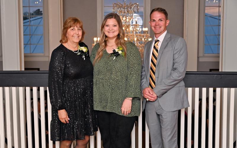 Summers Elementary’s VPK program earned a perfect score for the second straight year on the Classroom Scoring System (CLASS). The program is led by VPK teacher Karen McDonald (left) and assistant Kelsie Rodriguez (middle), who are pictured at the Columbia County Schools Teacher of the Year banquet in November with Summers Principal Robert Cooper. (COURTESY COLUMBIA COUNTY SCHOOLS)