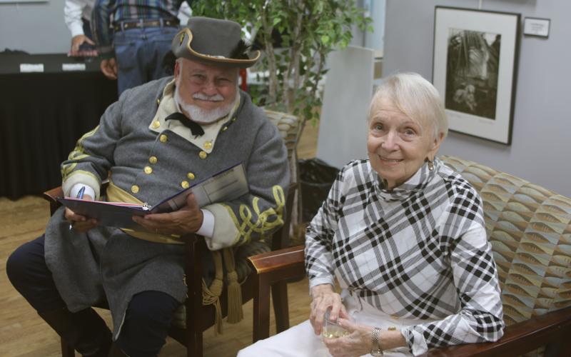 Blue Grey Army Commanding General Tony Buzzella and Executive Director Faye Bowling Warren enjoy a break at the Olustee Festival sponsor reception. (TONY BRITT/Lake City Reporter)