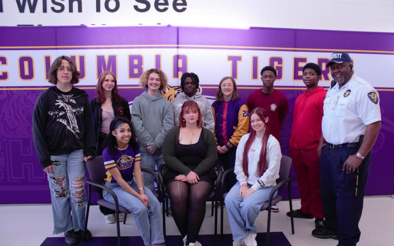 Golden Voice contestants Jaleiah Burch (front row, from left), Hailey Cross and Aleah Rogers; Asher Watson (back row, from left), Catherine Ward, Nolan Peloni, Micah Williams, Laila Striebel, Michael Goodbread, Damieon Jernigan stand with competition founder Ronnie Collins. Not pictured are contestants Caroline Sawyer and Elora Rodgers. (COURTESY)