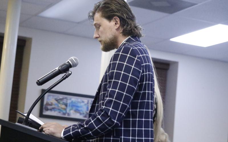 Cameron Myers with Fox Lagoon speaks to the Lake City Council about his proposal to turn city-owned property into a ‘high-end’ tourist development. The council later authorized a study on the property to be used for its wastewater system instead of that project and a potential housing development. (JAMIE WACHTER/Lake City Reporter)
