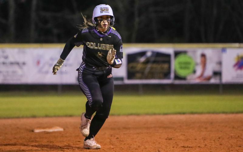 Columbia center fielder Luisa Taylor races to third base during Monday's win over Branford. (BRENT KUYKENDALL/Lake City Reporter)