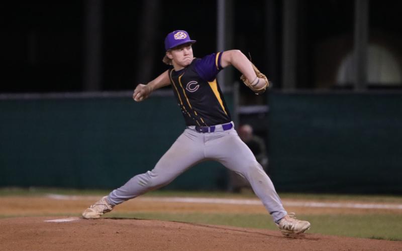 Columbia pitcher Trayce McKenzie pitches against Suwannee on March 4. (BRENT KUYKENDALL/Lake City Reporter)