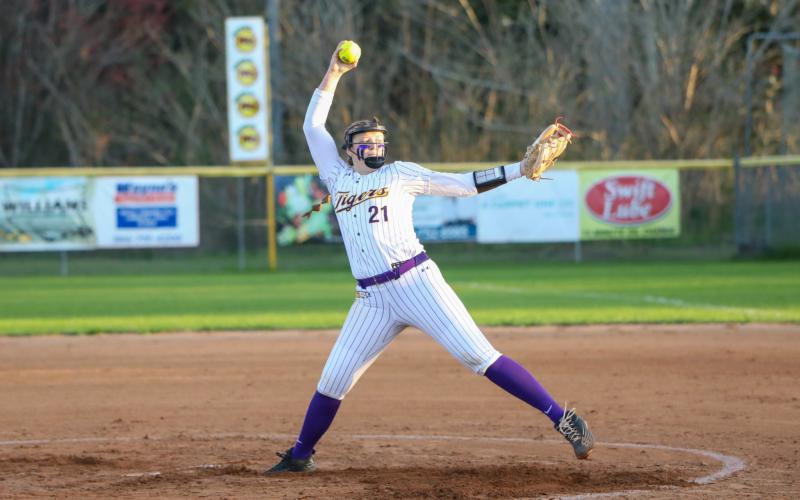 Columbia pitcher Harleigh Price pitches against Fort White on March 5. (BRENT KUYKENDALL/Lake City Reporter)