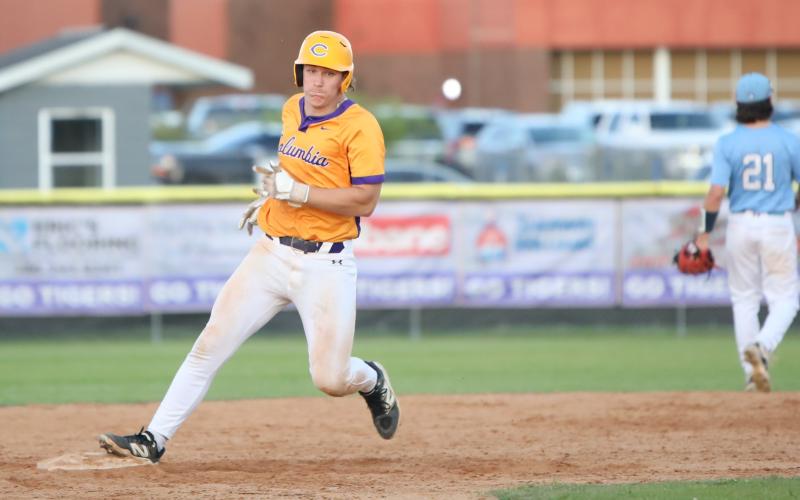 Columbia's Ayden Phillips round second base after a base hit during Tuesday's win over St. Johns Country Day. (BRENT KUYKENDALL/Lake City Reporter)