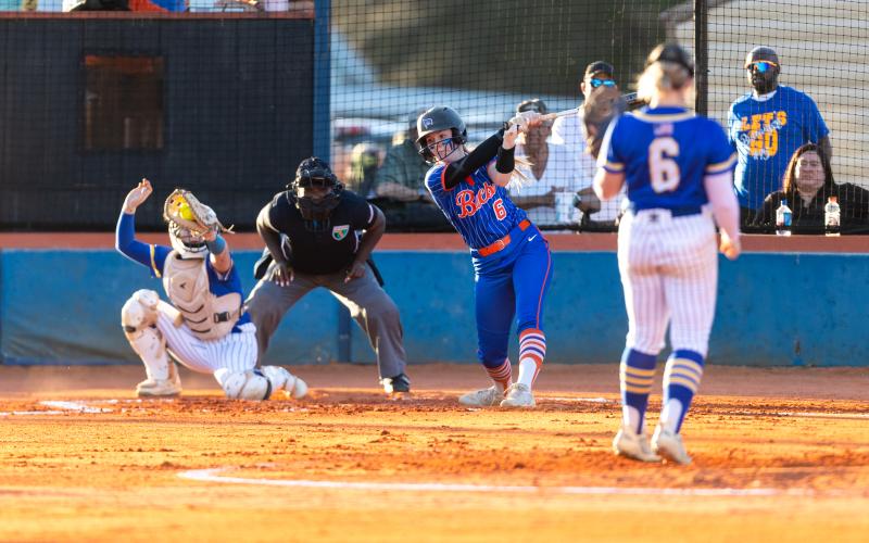 Branford third baseman Madyson Sikes swings through a pitch from Crystal River pitcher Violet Flynn on Tuesday. (JACK HOWDESHELL/Lake City Reporter)