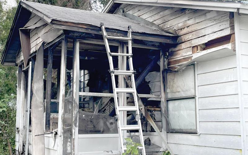 A fire burned the back porch of a residence on SE St. Margaret Drive on Thursday. The home owner was not injured by two dogs did die in the fire. (COURTESY LAKE CITY FIRE DEPARTMENT)
