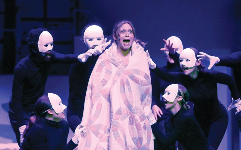 Betsy Peterson, portraying Sophie, reacts during a nightmare from Mamma Mia! The Suwannee High Theatre Troupe is performing the musical Thursday and Saturday at the SHS auditorium. (JAMIE WACHTER/Lake City Reporter)