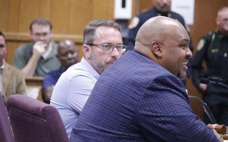 Sen. Corey Simon (right) speaks during the Hamilton County delegation meeting last month while Rep. Jason Shoaf (left) looks on. Simon and Shoaf agreed at that meeting to advance a local bill in the session to abolish the White Springs town government. (FILE)