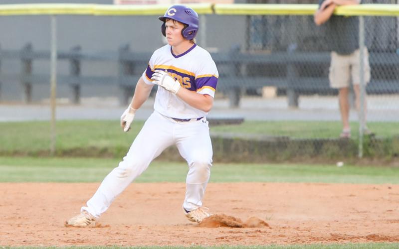 Columbia shortstop Trayce McKenzie turns off first base after a base hit against Flagler Palm Coast on April 4. (BRENT KUYKENDALL/Lake City Reporter)