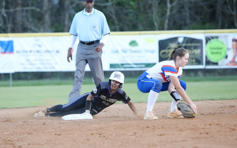 Columbia left fielder Sakiya Merriex slides safely into second base against Bolles on Feb. 27. (BRENT KUYKENDALL/Lake City Reporter)