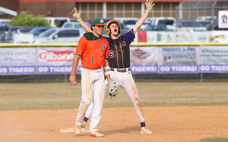 Columbia pitcher Bynton Edge celebrates at second base after driving in a run against Mosley during Game 2 of the Region 1-5A quarterfinals. (BRENT KUYKENDALL/Lake City Reporter)