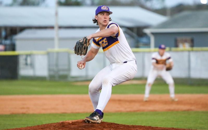 Columbia pitcher Ayden Phillips winds up to pitch against Buchholz on March 14. (BRENT KUYKENDALL/Lake City Reporter)
