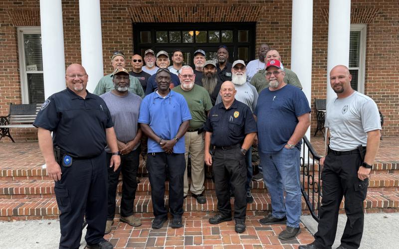 Retired law enforcement officers from around Suwannee County took firearm proficiency training last week at the Live Oak Police Department. Pictured with the retirees, who all passed, are Live Oak Police Capt. Jason Rountree (left), Chief Keith Davis (front middle) and Lt. Doug Hohman (right). (COURTESY)