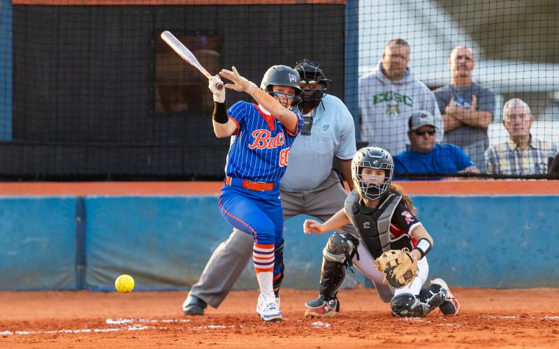 Branford catcher Morgan Brennan knocks a base hit against Lafayette on March 13. (JACK HOWDESHELL/Lake City Reporter)