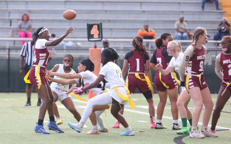 Florida High quarterback Danielle White throws under pressure from the Suwannee defense during the Region 1-1A semifinals on Monday night. (PAUL BUCHANAN/Lake City Reporter)