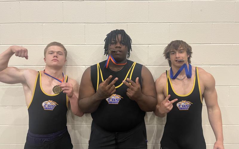 Columbia lifters Garret Shipley (left) and Chase Johnson (middle) won Region 1-2A titles in the 199 and unlimited classes, while Cameron Stephenson (right) was runner-up in the 169 class on Saturday. (COURTESY)