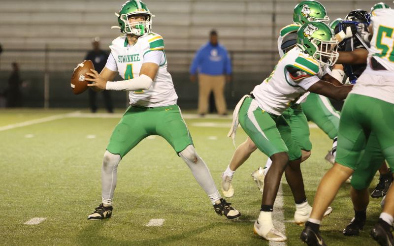 Suwannee quarterback Thomas Sikes drops back to pass against Godby in Region 1-3A quarterfinals on Nov. 15, 2024. (PAUL BUCHANAN/Lake City Reporter)