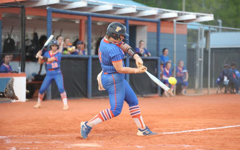 Branford's Victoria Swain makes contact with a pitch against Crystal River on March 18. (PAUL BUCHANAN/Lake City Reporter)