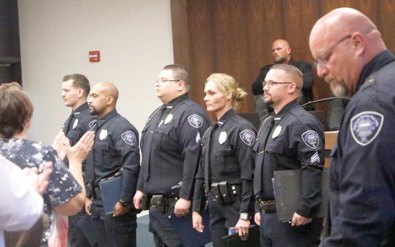 Live Oak police officers Andrew Cook (from left), Evelio Alvarez, Sgt. Gerald Butler III, Brandie Harden and Sgt. Mark Pierce were honored for their actions in pursuing and neutralizing murder suspect Dominic Caraway in February. (JAMIE WACHTER/Lake City Reporter)