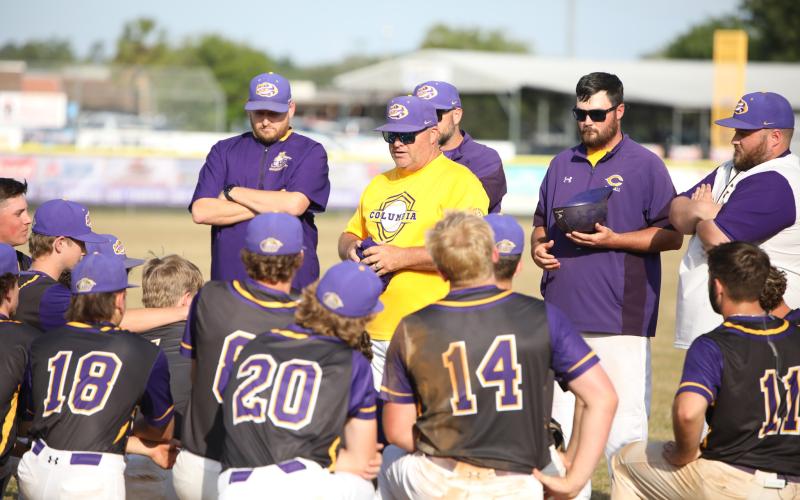 Columbia coach Chris Howard speaks to his team following the Tigers' sweep over Mosley in the Region 1-5A quarterfinals on April 24. (BRENT KUYKENDALL/Lake City Reporter)