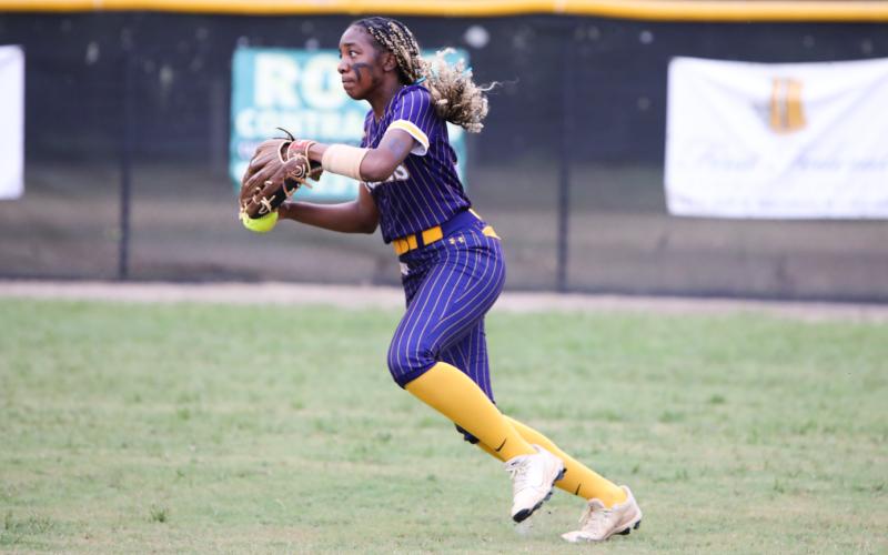 Columbia right fielder Brooklynn White turns to throw the ball back to the infield after a Baker County base hit during the District 3-4A championship on May 1. (BRENT KUYKENDALL/Lake City Reporter)