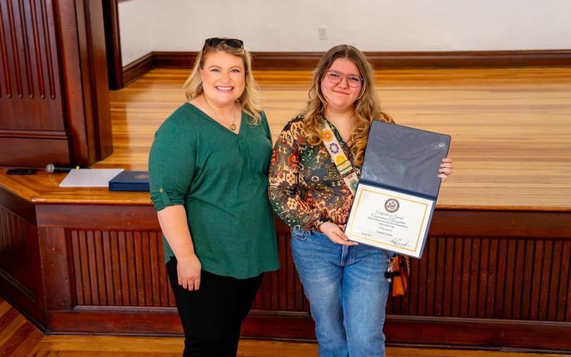 Branford sophomore Jayden Jones won first place in the drawing category of the Congressional Art Contest for Florida’s Third District. Jones is pictured with Congresswoman Kat Cammack. (COURTESY)