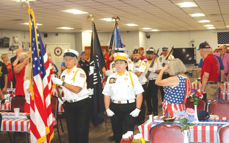 The American Legion Post 57 honor guard presents the colors during the organization’s Memorial Day ceremony on Monday. (TONY BRITT/Lake City Reporter)