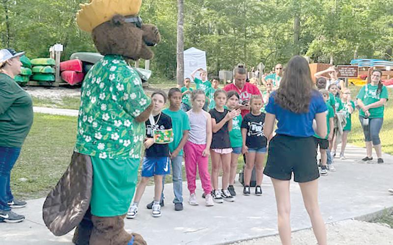 Bellamy the Beaver hosted a water celebration at Ichetucknee Springs State Park recently where students conservation and hands-on science. (COURTESY)