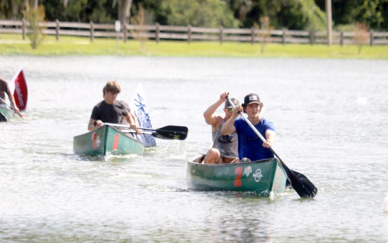Brock and William Dees, the winners of the inaugural DeSoto Derby Canoe Race last year, lead down the home stretch. (FILE)