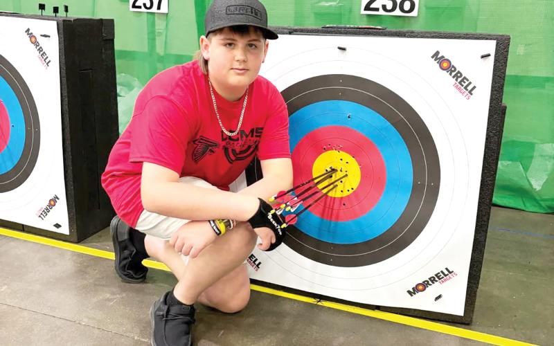 Lake City Middle School’s Chase Bryant is pictured at the Eastern National Archers in Schools Program tournament in Kentucky in early May. Bryant qualified for the NASP World Tournament. (COURTESY)