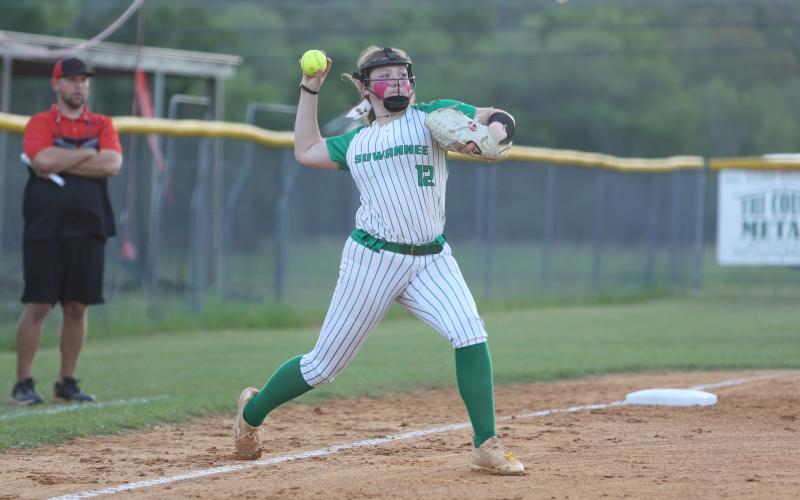 Suwannee third baseman Felicity May throws to first base against Fort White on April 4. (PAUL BUCHANAN/Lake City Reporter)