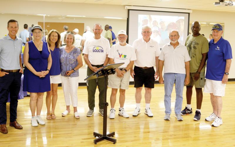 Lake City Columbia Community Tennis Association members and guests who have a tremendously positive influence on the program and its development, pose for a picture on Thursday afternoon in Teen Town during the organization’s 10th Anniversary celebration event. (TONY BRITT/Lake City Reporter)
