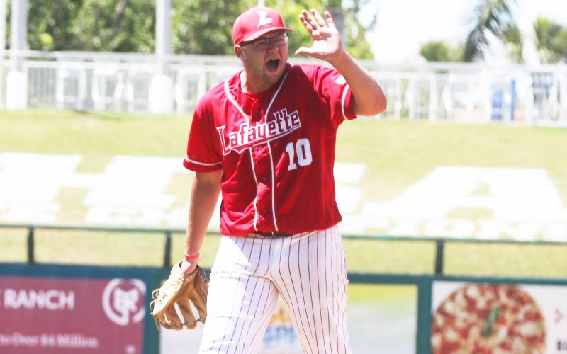 Lafayette pitcher Ethan Tuten waves goodbye to the Trenton dugout after finishing off the Hornets’ 5-1 win in the Class Rural state semifinals on Wednesday. (MORGAN MCMULLEN/Lake City Reporter)