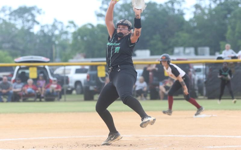 Suwannee pitcher Gracie Watley winds up for a delivery during Wednesday’s Region 1-3A quarterfinals against West Nassau. The two teams will continue play Friday after rain and lightning postponed the 0-0 tie. (MORGAN MCMULLEN/Lake City Reporter)