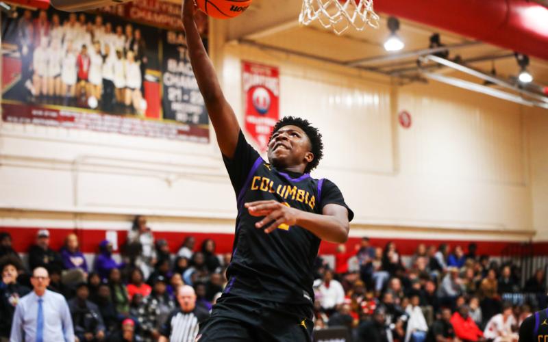 Columbia guard Shaheed White rises for a layup against Santa Fe this past season. (BRENT KUYKENDALL/Lake City Reporter)