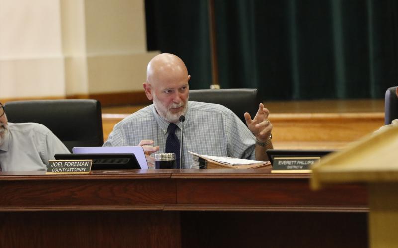 County Attorney Joel Foreman said the $565,789 settlement for the land acquisition was a good deal, noting eminent domain would wind up costing the county a lot more. (JAMIE WACHTER/Lake City Reporter)